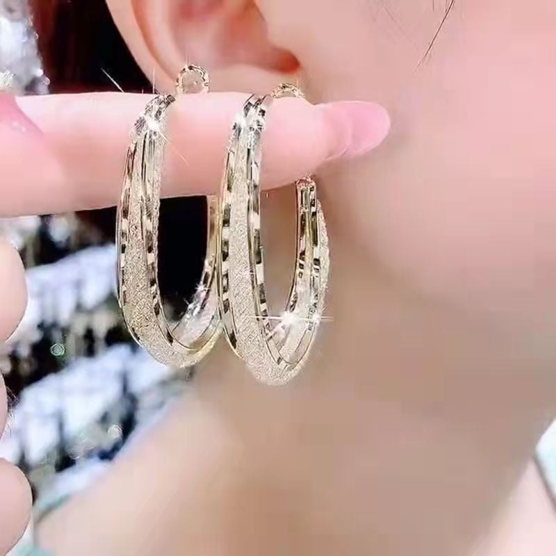 Ressa - Twisted Oval Hoop Earrings