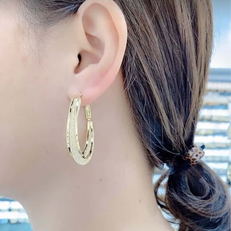 Ressa - Twisted Oval Hoop Earrings