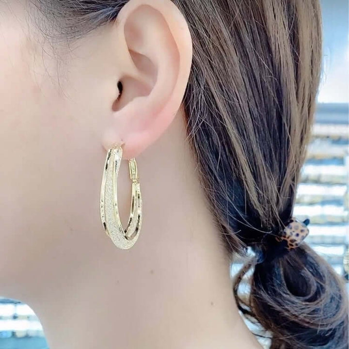 Ressa - Twisted Oval Hoop Earrings